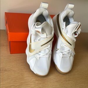 Nike White and Gold Sneakers Modern Design